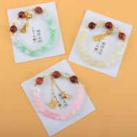MZQ檀木珠双色珠铃铛吊坠手链