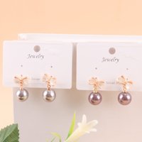 MZQ猫眼领结珍珠耳坠